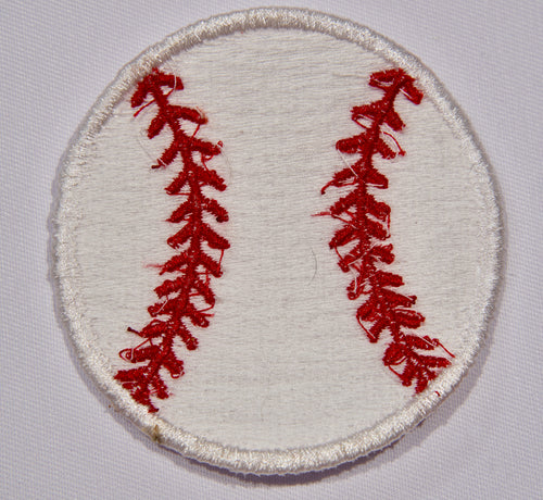 Back: A ln embroidered patch with a baseball motif.