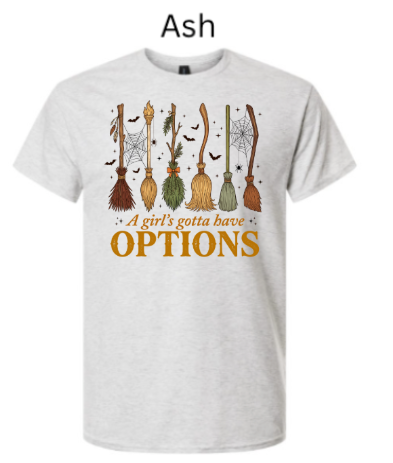 A Girl's Gotta Have Options witch t-shirt ash heather off-white with six colorful witch brooms spiders webs bats Halloween vintage neutral design orange text graphic tee