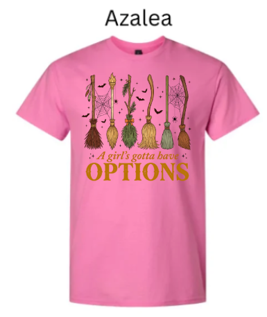 A Girl's Gotta Have Options witch t-shirt azalea pink with six illustrated witch brooms spiders webs bats Halloween girls funny design warm orange text