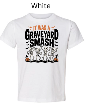 It Was A Graveyard Smash skeleton t-shirt white with four dancing skeletons Halloween pumpkins bats tombstones children's graphic tee