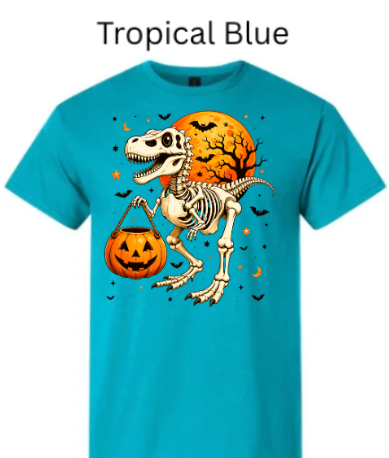 Skeleton T-Rex dinosaur Halloween t-shirt Tropical blue teal with skeleton dinosaur holding pumpkin candy bucket orange moon bats stars bright graphic tee