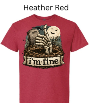 "Red heather t-shirt with spooky Halloween design: skeleton hand rising from grave, thumbs up gesture, RIP stone marker, smiling moon ghost, 'I'm Fine' ribbon"