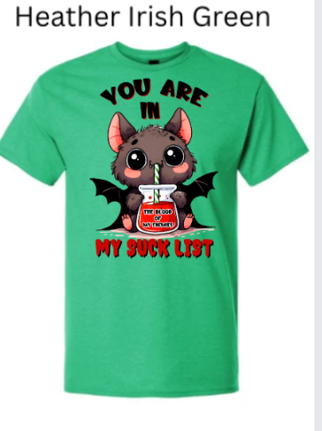 "Green heather crew neck t-shirt with cute bat Halloween graphic: large-eyed vampire bat with straw in blood jar, 'You Are In My Suck List' bold lettering, black wing detail"