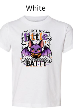 "White children's t-shirt with adorable purple baby bat graphic, 'Just A Little Batty' phrase in multicolor letters, skulls and bats decorative frame, toddler Halloween tee"