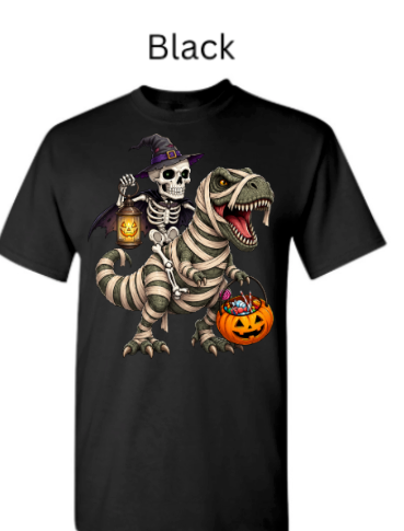 "Black crew neck t-shirt displaying skeleton witch riding wrapped T-Rex dinosaur, jack-o'-lantern lanterns, pumpkin candy basket, spooky Halloween dino witch design"
