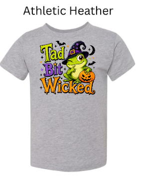 "Athletic heather grey youth t-shirt with Tad Bit Wicked green witch frog holding pumpkin Halloween design"