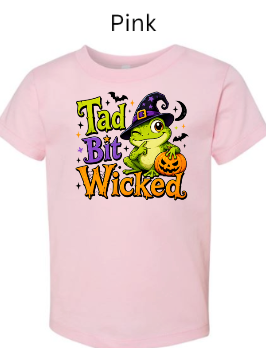 "Light pink kids t-shirt featuring Tad Bit Wicked frog wizard Halloween art"