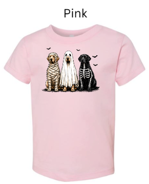 Halloween dog trio t-shirt in light pink with tan mummy dog white ghost dog black skeleton dog and bats above — adorable Halloween puppy shirt for girls toddlers