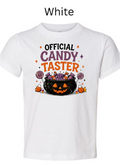 Official Candy Taster Halloween youth t-shirt in white with bright pumpkin cauldron candy design and lollipops — classic Halloween shirt for toddlers trick-or-treating