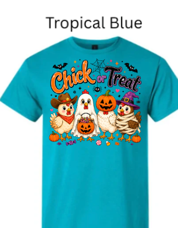 Vibrant tropical blue t-shirt with "Chick or Treat" Halloween design showing five funny chickens dressed as cowboy, ghost, jack-o'-lantern, witch and mummy with seasonal decorations on bright teal fabric