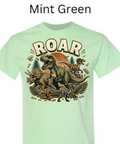 "Mint green children's t-shirt with colorful dinosaur illustration and ROAR text"